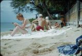 Sunbathing on a beach, Oahu