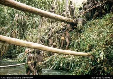 Group of men building a structure