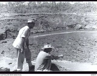 RABAUL, NEW BRITAIN, 1946-03-01. AFTER A LONG PERIOD OF HEAT, SELF COMBUSTION OF CORDITE CAUSED A FIRE IN 5,500 TONS OF JAPANESE AMMUNITION AWAITING DUMPING OFF RABAUL. ALL THE AMMUNITION WAS ..