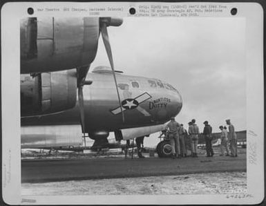 Crew Of Major General Emmett O'Donnell'S Plane - The Boeing B-29 'Dauntless Dotty' - Awaits Take Off For Bombing Mission Over Tokyo, Japan. Saipan, Marianas Islands, November 1944. (U.S. Air Force Number 64263AC)