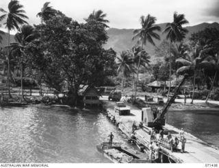 MILNE BAY, NEW GUINEA, 1944-03-16. A TRUCK LOAD OF SAILORS LEAVING LYALL WHARF AFTER DISEMBARKING FROM HT TAROONA