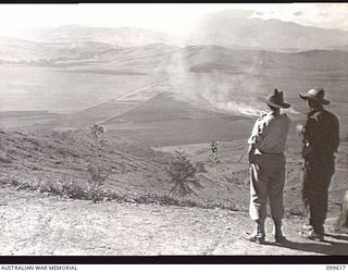 AIYURA, NEW GUINEA, 1946-01-09. THE VIEW FROM AUSTRALIAN NEW GUINEA ADMINISTRATIVE UNIT EXPERIMENTAL STATION LOOKING TOWARDS KIANTU, WHICH LIES IN THE FAR VALLEY. THE VIEW OVERLOOKS NATIVE FOODS ..