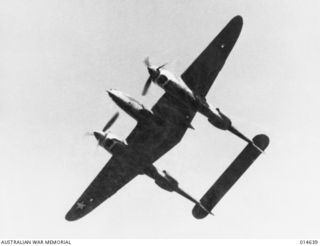 1943-04-13. NEW GUINEA. LOCKHEED LIGHTNINGS (P38) IN FLIGHT. (NEGATIVE BY N. BROWN)