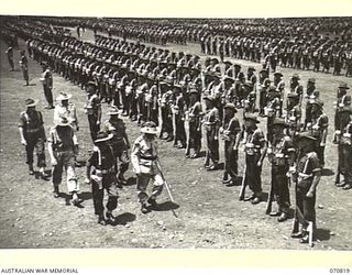 LAE, NEW GUINEA, 1944-03-08. THE GENERAL OFFICER COMMANDING 2ND AUSTRALIAN CORPS, VX20308 MAJOR-GENERAL F.H. BERRYMAN, CBE, DSO, (1), PICTURED WITH NX94 LIEUTENANT COLONEL K.H. MONTGOMERY (2), ..