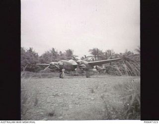 MILNE BAY, PAPUA, C.1943-04. P38 LIGHTNING AIRCRAFT "THE FLYING DUTCHMAN" IN DISPERSAL BAY AT NO. 3 STRIP (TURNBULL FIELD). (DONOR - T. G. JONES)