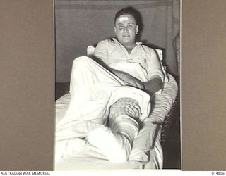 1943-05-07. NEW GUINEA. MILNE BAY. AN ALLIED VESSEL WAS HIT DURING THE 1943-04-14, JAPANESE RAID ON MILNE BAY. PICTURE SHOWS DR. PAUL SCHUDMKA, DOCTOR OF THE SHIP. (NEGATIVE BY N. BROWN)