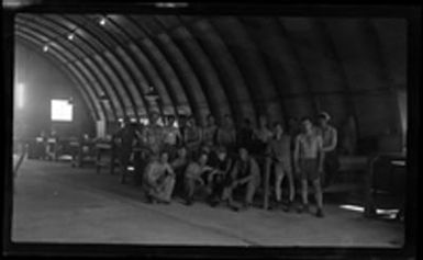 [Servicemen in Quonset hut]