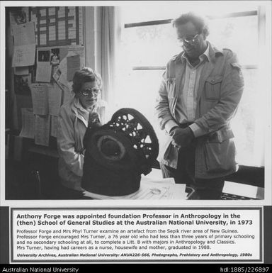 Professor Anthony Forge and Mrs Phyl Turner inspecting an artefact from the Sepik river of New Guinea