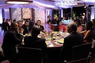 Barack Obama and Michelle Obama attend the Leaders Dinner at the APEC summit in Honolulu, Hawaii, November 12, 2011