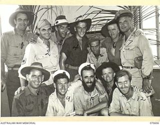 PORT MORESBY, PAPUA, 1944-02-25. ALLIED SOLDIERS AND SAILORS AT THE CANTEEN OF THE AUSTRALIAN DEFENCE CANTEENS SERVICE