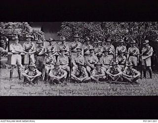 LAE, 1941-06. MEMBERS OF THE LAE PLATOON OF THE NEW GUINEA VOLUNTEER RIFLES. LEFT TO RIGHT, BACK ROW: PRIVATE (PTE) DES LANECRAPLE, PTE ROY BARNETT, PTE HECK BALDWIN, CORPORAL (CPL) HUGH LYON, PTE ..