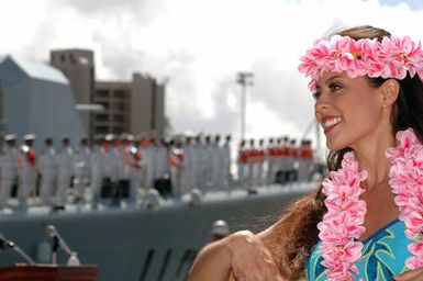 A Polynesian dancer performs a traditional hula dance for the Chinese Peoples Liberation Army Navy Sailors from the Luhu (Type 052) Class Guided Missile Destroyer QINGDAO (DDG 113) before they depart Naval Station Pearl Harbor, Hawaii, on Sept. 10, 2006 after a Goodwill Visit. The visit provides an excellent opportunity to enhance cooperation between the two navies and underscores the United States commitment to supporting ongoing cooperative efforts in the Pacific Region. (U.S. Navy photo by Mass Communication SPECIALIST 1ST Class James E. Foehl) (Released)