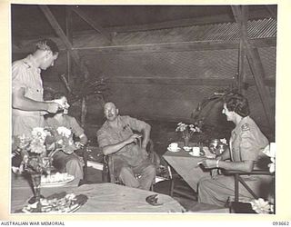 TOROKINA, BOUGAINVILLE, 1945-07-03. HIS ROYAL HIGHNESS, THE DUKE OF GLOUCESTER, GOVERNOR-GENERAL OF AUSTRALIA (3), HAVING TEA IN THE SISTERS' MESS, 2/1 GENERAL HOSPITAL. IDENTIFIED PERSONNEL ARE:- ..