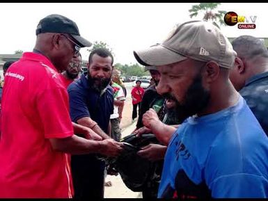 GOVERNOR LEADS CLEANUP