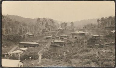 Edie Creek, showing the offices store and mess [Central New Guinea], October 1936