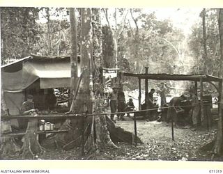 SCARLET BEACH, NEW GUINEA, 1944-03-19. ARMY COOKS RECEIVING TRAINING IN FIELD COOKING AND CATERING AT THE 22ND INFANTRY BATTALION, 5TH DIVISION AND SUPERVISED BY WARRANT OFFICER II, R. STEWART, ..