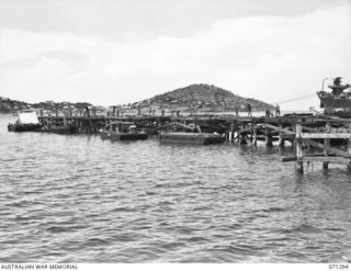 PORT MORESBY, PAPUA, 1944-03-21. A GENERAL VIEW OF THE NEW NAVAL OILING WHARF UNDER CONSTRUCTION BY THE 2/16TH FIELD COMPANY, ROYAL AUSTRALIAN ENGINEERS