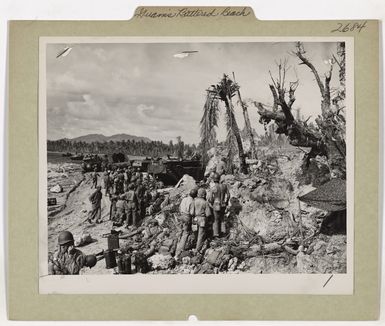 Marines And Coast Guardsmen On Guam's Battered Beach