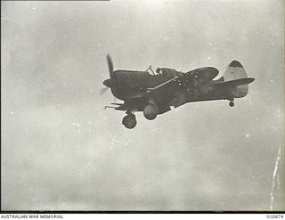 NADZAB, NEW GUINEA. C. 1944-02. A BOOMERANG AIRCRAFT, SERIAL NO. 7-OE, OF NO. 4 (ARMY COOPERATION) SQUADRON RAAF, COMING IN FOR A LANDING AFTER STRAFING THE JAPANESE IN THE SAIDOR AREA ON THE NORTH ..