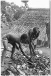 Folofo'u and Taaboo with stones for stone oven