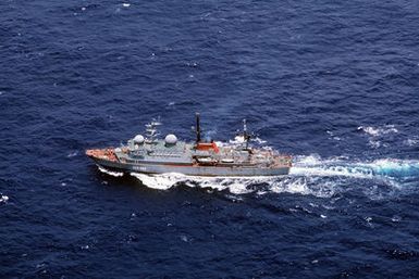 A Soviet Balzam class ship (SSV-493) observes the ships taking part in Exercise RimPac '88 off the coast of Hawaii