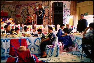 Reverend Tangaroa Uea, leads the gathering in a prayer, at hair-cutting ceremony for Kayne Lucas Upokokeu, Mangere, Auckland