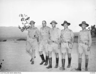 PORT MORESBY, PAPUA, 1942-07. GROUP OF OFFICERS OF 30TH AUSTRALIAN INFANTRY BRIGADE. LEFT TO RIGHT:- LIEUTENANT-COLONEL N. L. FLEAY, COMMANDING KANGA FORCE; BRIGADIER S. H. W. C. PORTER, BRIGADE ..