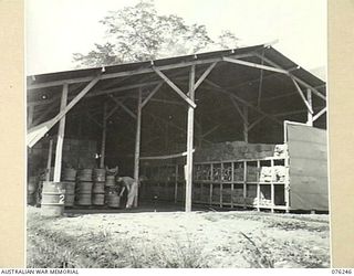 LAE, NEW GUINEA. 1944-09-27. A STORAGE SHED AT THE 43RD ORDNANCE DEPOT