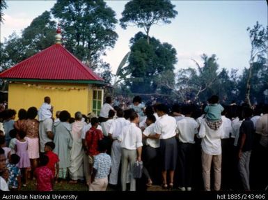 Crowd gathered around building