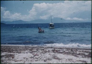 On the beach, boat and canoe : Bwalalea village, D'Entrecasteaux Islands, Papua New Guinea, 1956-1958 / Terence and Margaret Spencer