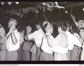 RABAUL, NEW BRITAIN, 1945-12-27. PATIENTS AND STAFF ENJOYING THEMSELVES AT THE SOCIAL EVENING ORGANISED BY THE AUSTRALIAN RED CROSS FOR PATIENTS OF 118TH AUSTRALIAN GENERAL HOSPITAL