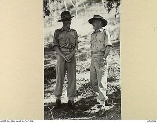 PORT MORESBY, PAPUA, 1944-03-13. VX12014 MAJOR-GENERAL E.J. MILFORD, DSO (1), MAJOR-GENERAL, GENERAL STAFF, HEADQUARTERS, NEW GUINEA FORCE, WITH HIS AIDE-DE-CAMP QX788 LIEUTENANT A. VIRTUE (2)