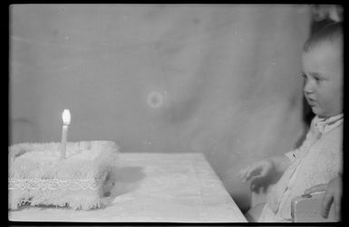 Margaret Hare looking at birthday cake