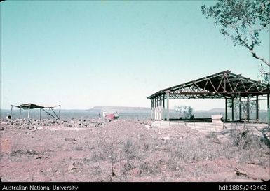 Men constructing a building