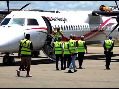 Air Niugini Boeing 767 returns from Brisbane after pilot's windshield cracks during flight.