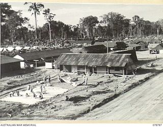 BOUGAINVILLE ISLAND. 1945-01-29. A GENERAL VIEW OF THE 21ST AUSTRALIAN GENERAL HOSPITAL AT THE 1945-01-30, SHOWING THE PROGRESS MADE IN THE CONSTRUCTION OF THE UNIT