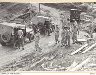 TOROKINA, BOUGAINVILLE. 1945-03-30. LADY WAKEHURST (1), AND PARTY LEAVING THE 2/3 CONVALESCENT DEPOT