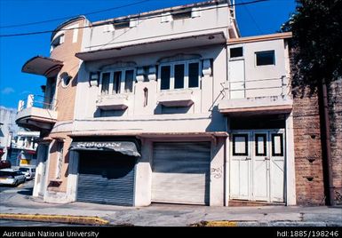 New Caledonia - white building, 'Sepharade' printed on door awning