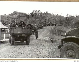 PORT MORESBY, PAPUA, NEW GUINEA. 1944-01-05. TROOPS OF THE 58/59TH AUSTRALIAN INFANTRY BATTALION, 15TH AUSTRALIAN INFANTRY BRIGADE MOVING TO THE AIRSTRIP FOR THEIR TRANSFER TO DUMPU. IDENTIFIED ..