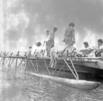 Group in outrigger canoe