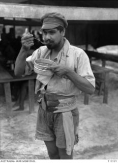 BALIKPAPAN, BORNEO, 1945-08-07. SIAR GUL, OF 2ND BATTALION, 15TH PUNJAB REGIMENT AND EX PRISONER OF WAR OF THE JAPANESE. THIS INDIAN UNIT FOUGHT AT KUCHING GARRISON UNTIL CAPTURED BY THE JAPANESE ..