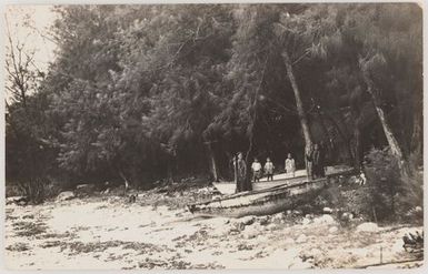 People standing by a boat