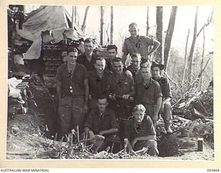 WEWAK AREA, NEW GUINEA. 1945-06-27. MORTAR CREW ON HILL 2, AFTER C COMPANY, 2/8 INFANTRY BATTALION, FINALLY CAPTURED MOUNT SHIBURANGU. (FOR IDENTIFICATION OF 11 NAMED PERSONNEL REFER TO PROVISIONAL ..