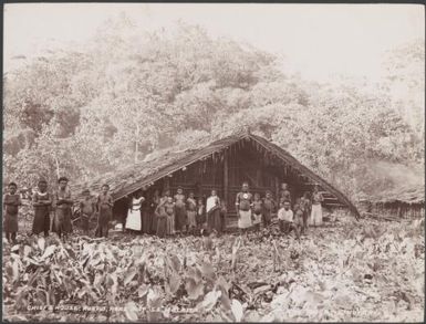 Villagers standing outside the chief's house at Ruapu, Malaita, Solomon Islands, 1906 / J.W. Beattie