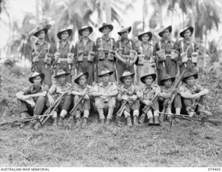 MADANG, NEW GUINEA. 1944-07-03. PERSONNEL OF NO. 4 PLATOON (TANK ATTACK) HEADQUARTERS COMPANY, 24TH INFANTRY BATTALION. VX104458 PRIVATE K.S. JONES (1); VX104455 SERGEANT V.M. HUNT (2); VX106306 ..