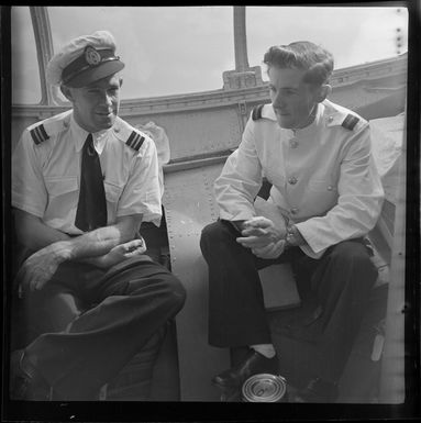 Qantas engineer A J Cattenach (left) with flight steward R M White, Sydney Fiji service