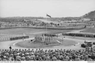 Port Moresby, Papua. 1944-08-05. General view of the opening ceremony of the Bomana War Cemetery. In the foreground are service personnel, then left to right: buglers of the Royal Papuan ..