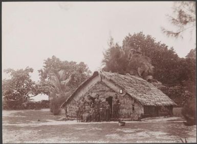 Teachers and children at the school house of Matema, Reef Islands, 1906 / J.W. Beattie
