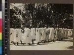 Group of Girls' School students walking to class, Beru, Kiribati, 1913-1914