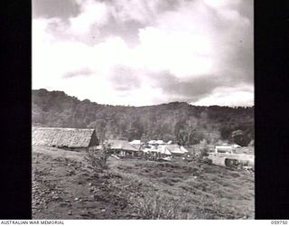 KOITAKI, NEW GUINEA. 1943-11-03. VIEW OF THE 47TH AUSTRALIAN CAMP HOSPITAL SHOWING FROM LEFT TO RIGHT, ADMINISTRATIVE BLOCK, WARD 4, HOSPITAL KITCHEN AND DISPENSARY